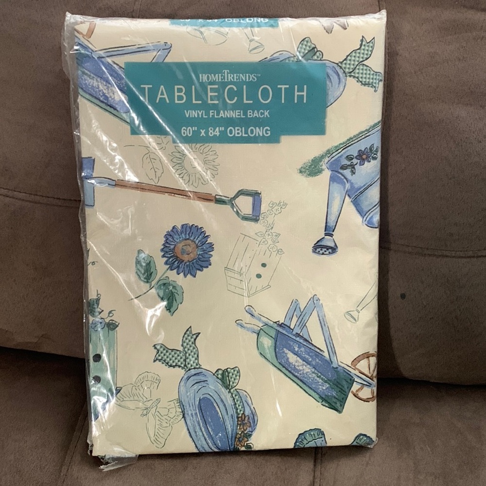 - Flannel Backed Vinyl Tablecloth - Outdoor Items.  NEW have 2